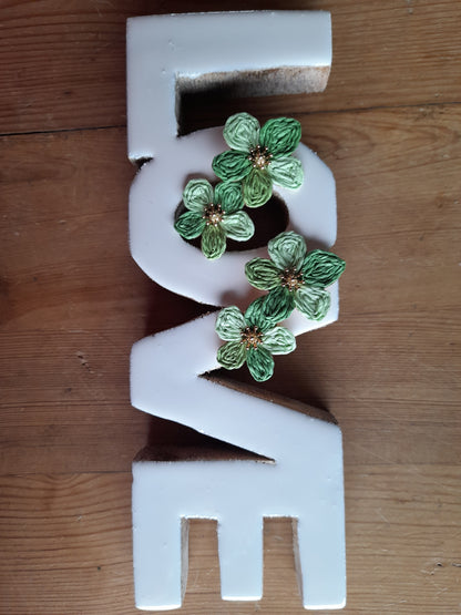 Boucle d’oreille fleurs