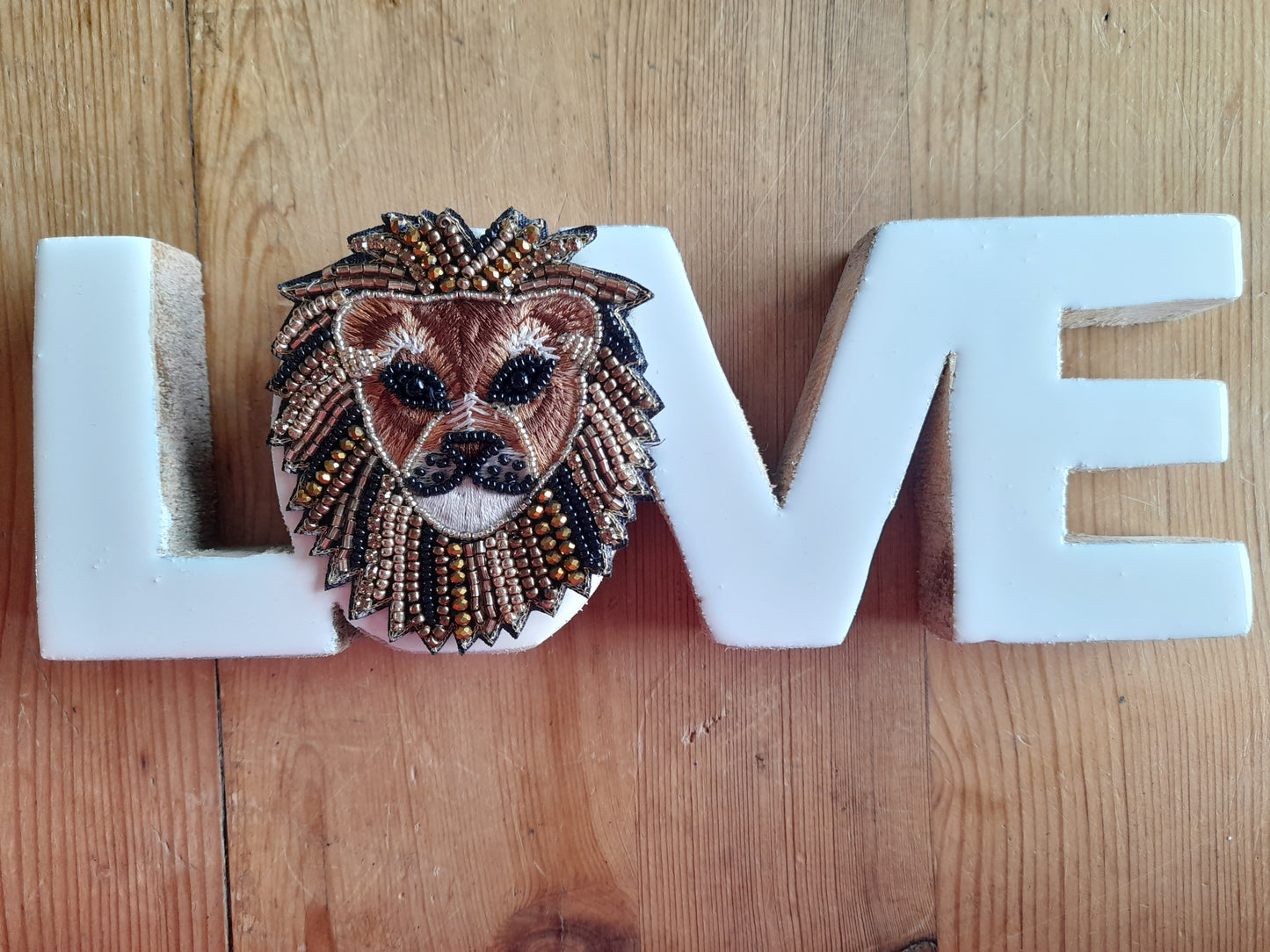 Broche lion