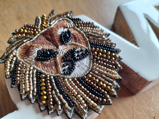 Broche lion