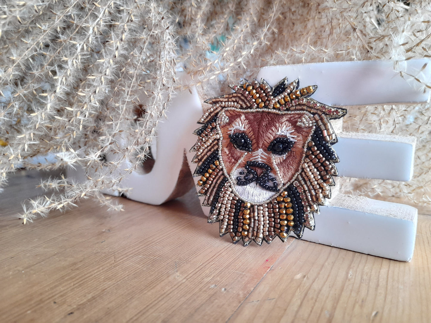 Broche lion